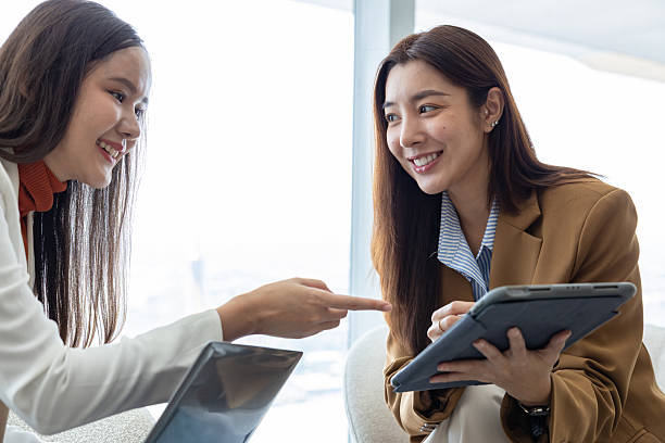 istock Businesswomen discussing strategy in modern office 2250173609