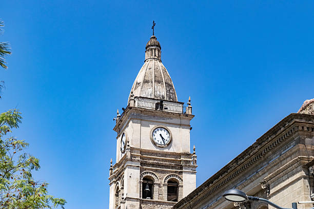 istock Cochabamba metropolitan cathedral clock tower against blue sky 2250174791