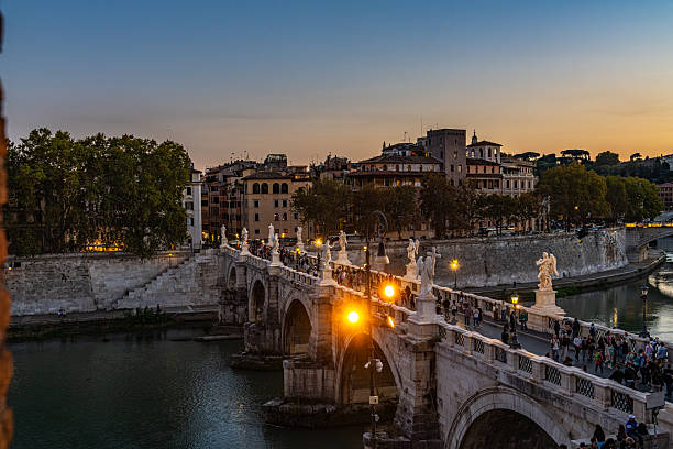 St. Angelo Bridge at dusk from Saint Angelo Castle in Rome, Italy. (Ponte Sant'Angelo, Castel Sant'Angelo)