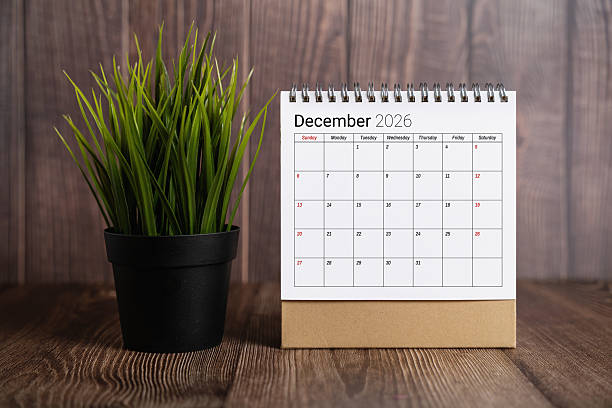 istock December 2026 Desk Calendar On Wood Table 2250181606