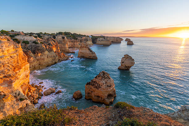 istock Marinha Beach, Cliffs and Atlantic Ocean at Sunrise. Portugal 2250183326