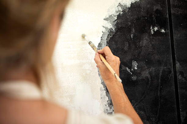 Mature entrepreneurial woman working in her art studio Buenos Aires - Argentina