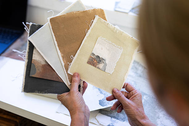 istock Mature female artist working in her studio 2250190108