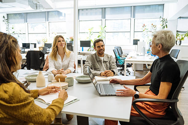 istock Creative entrepreneurs working in creative office with pottery and interior design solutions 2250195752