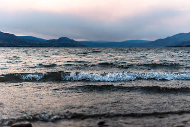 istock Rough waves on lake and storm clouds at sunset during summer thunderstorm 2250206848