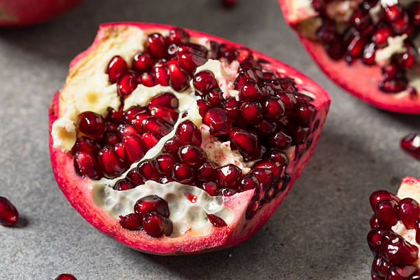 istock Sweet Organic Raw Red Pomegranate Fruit 2250215101
