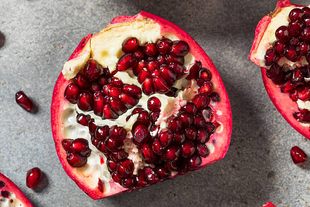 istock Sweet Organic Raw Red Pomegranate Fruit 2250215112
