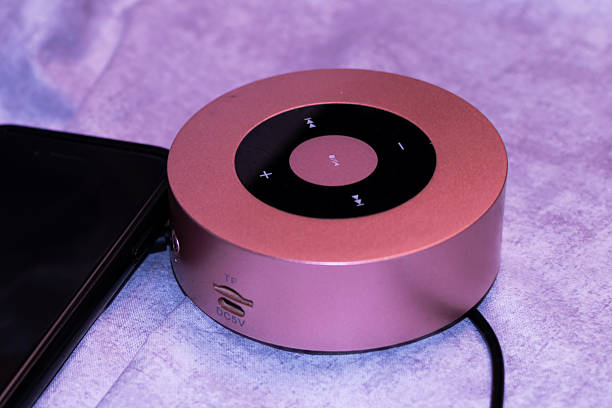 istock Portable bluetooth speaker that is pink and black 2250215395