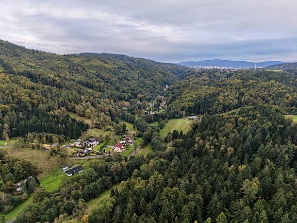 istock Serene Countryside Settlement With Gentle Hills, Remote Hamlet Surrounded By Lush Trees And Scenic Hillsides 2250215538