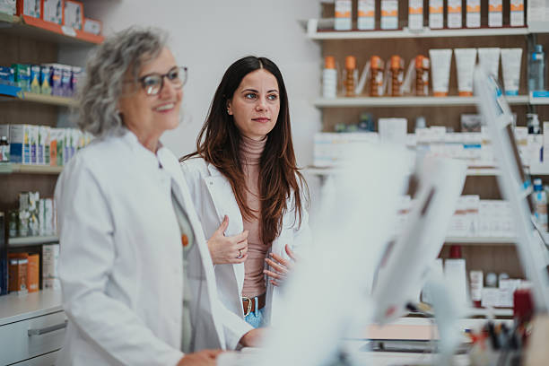 istock Pharmacists working together creating healthcare team 2250234563