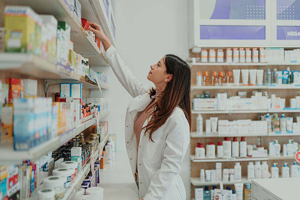 istock Female pharmacist working in retail pharmacy store 2250234666