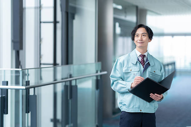 istock Male engineer performing building maintenance 2250237349