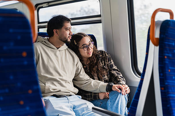 istock Couple Pointing at Landscape from Train Window 2250237643