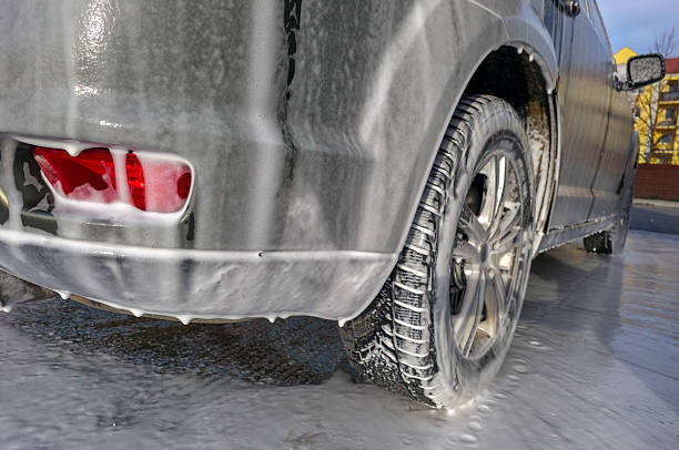 istock Self-service car wash. Washing the machine using active foam 2250249517
