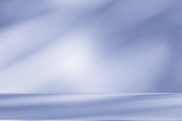 istock Studio style background wall decoration presentation uses white and blue tones. with shadows cast from a nearby window, concept creating a decorative 2250252470