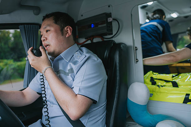 Young doctor doing his job in an ambulance