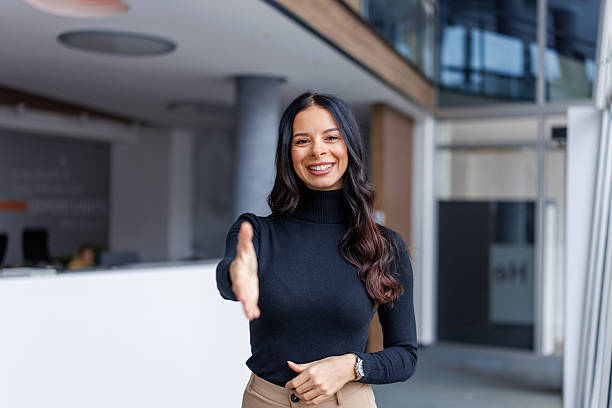 istock Professional businesswoman extending hand for handshake greeting 2250265480