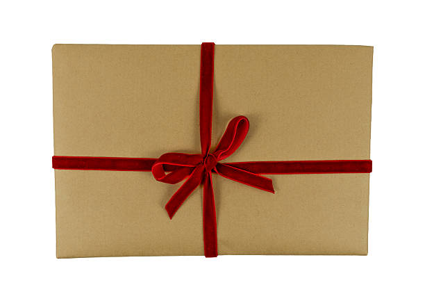 istock Wrapped Gift with Red Velvet Ribbon Bow Top View 2250267153