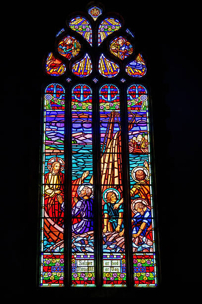 istock Old stained glass window in a church 2250271598