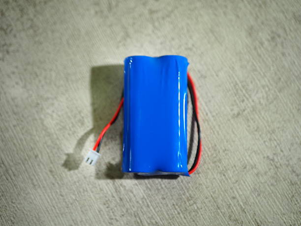 istock A rechargeable battery pack featuring a vibrant blue plastic casing and attached wires, designed for providing power to various 2250274084