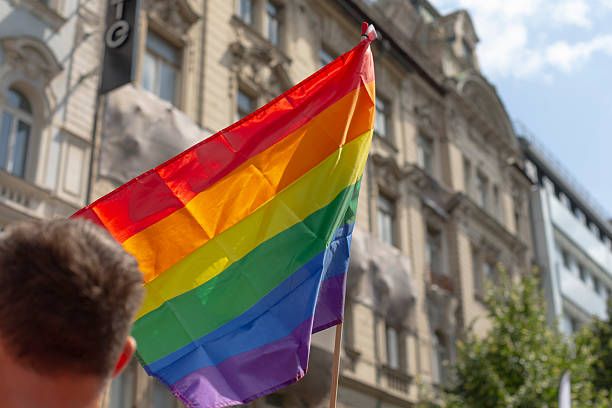 istock vibrant march through urban landscape, lively demonstration showcasing community unity and diversity 2250277428