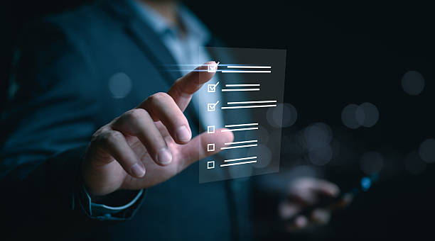 istock Business performance checklist, businessman using smartphone doing online checklist survey, filling out digital form checklist, take an assessment, questionnaire, evaluation, survey, online exam. 2250281636