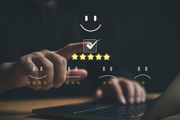 istock Customer service and Satisfaction concept ,Business people are touching the virtual screen on the happy Smiley face icon to give satisfaction in service. rating very impressed. 2250281733