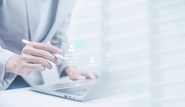 istock Businessman selecting digital candidate profile icons representing people management, employee relationship, recruitment strategy, and modern human resources solutions. HR digital business. 2250282601