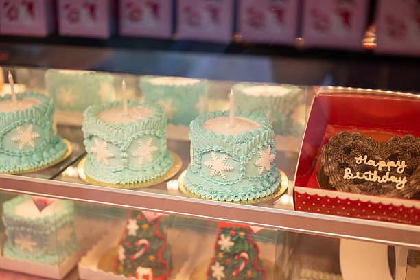 Christmas cakes on a pastry shop window, close-up