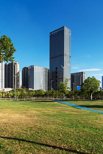 istock city park with modern building background in shanghai 2250286946