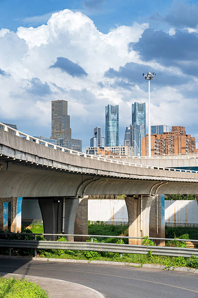 istock Concrete structure and asphalt road space under the overpass in the city 2250286975