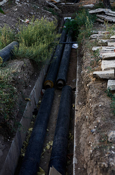 istock Underground Water Pipes Installed in Urban Construction Site for Infrastructure Development 2250288645