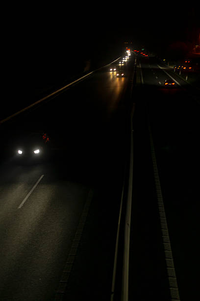Blurred lights of moving cars in the highway, Caracas city ,Venezuela.  Image made with Ektachrome film 35mm and scanned.
