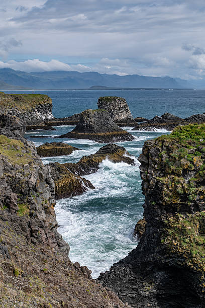istock Arnarstapi basalt rocks  in atlantic ocean in Iceland 2250293505