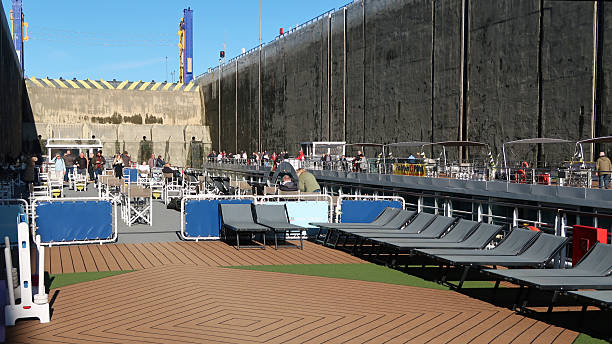 Gabcikovo lock, River Danube, Slovakia, October 29, 2025. On a deck of cruise ship inside large lock between Budapest and Bratislava. Sunny autumn day outdoors. Incidental people