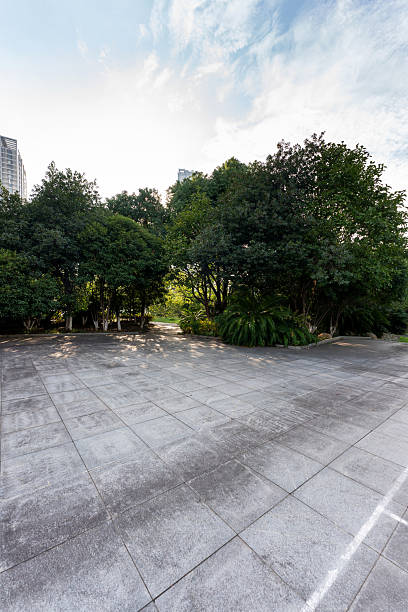 istock spring park and modern city 2250304386