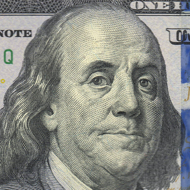 istock Close up view of a fifty dollar bill with Benjamin Franklin's face 2250306405