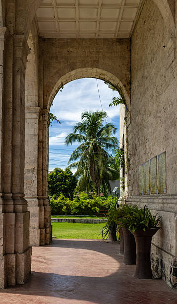 istock Historic Stone Archway Overlooking Tropical Garden 2250315334