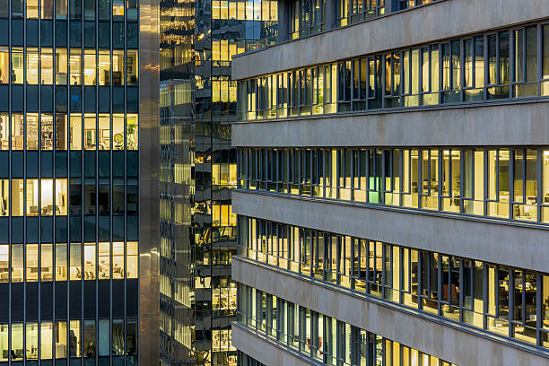istock Downtown Montreal office towers with illuminated windows at dusk 2250318980