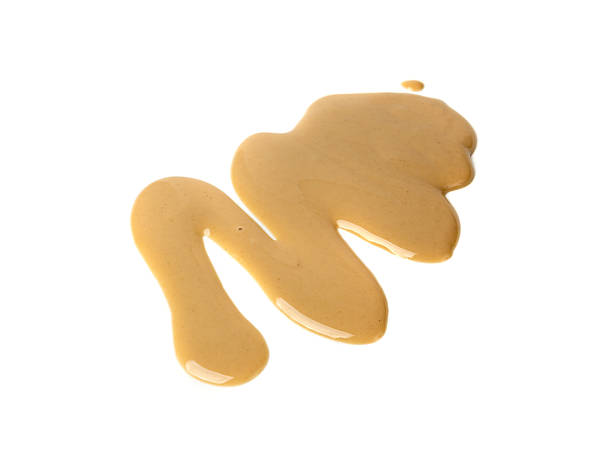 istock Tahini smear isolated, sesame seeds paste splash, spilled tahina sauce, spill eastern dip 2250319898