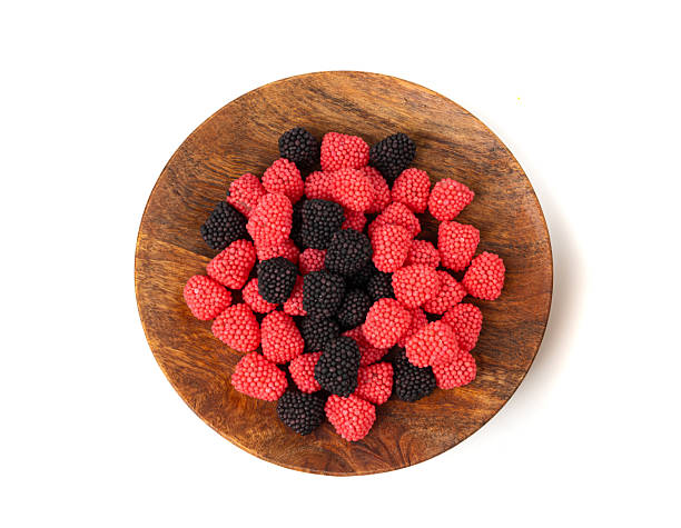 Gummy berries, chewy raspberries or jelly blackberries, gelatin candies fruit marmalade