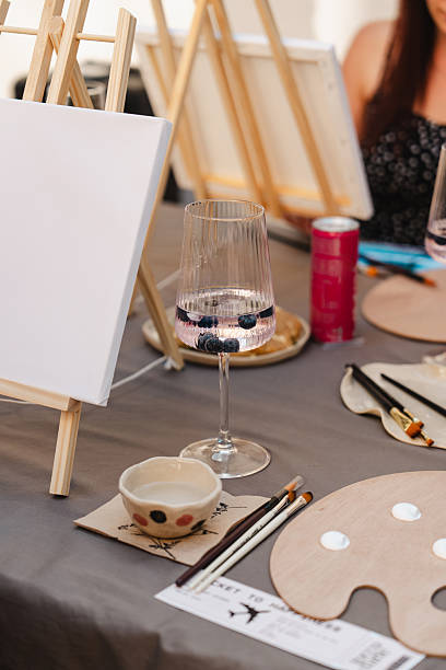 istock Art class with drinks and supplies set up outdoors on a sunny day 2250321594