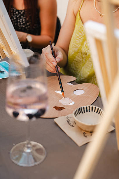 istock Art class, painting with watercolors on a sunny day 2250321605