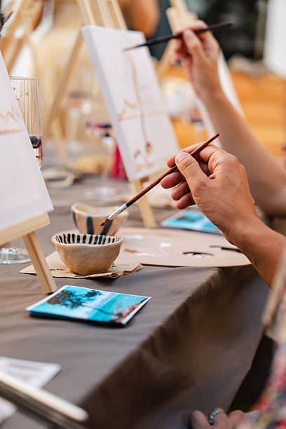istock Art class with easels, paintbrushes, and creative inspiration 2250321657