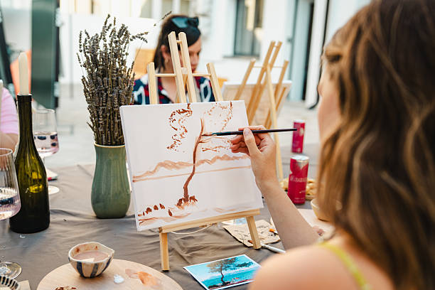istock Art class with painting on canvas 2250321685