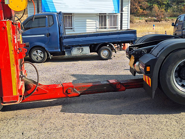 A truck being towed due to a breakdown