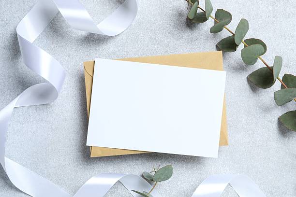 istock Green eucalyptus branches with paper card on marble background 2250329214