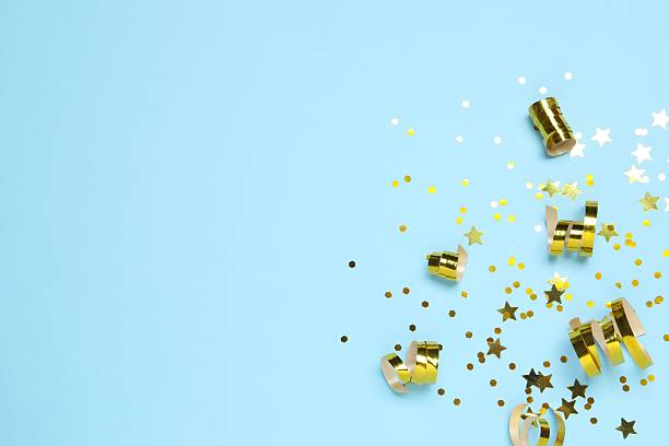 istock Golden confetti on color background, top view 2250336442