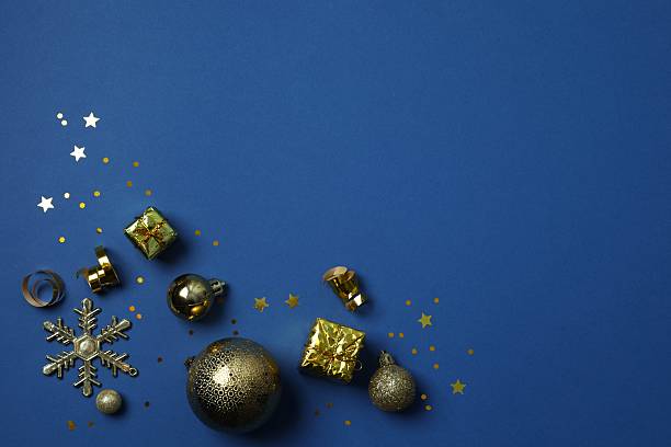 istock Festive background with Christmas decorations and confetti 2250337163