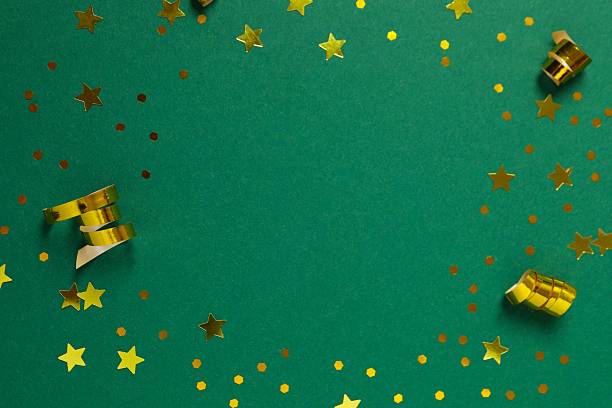 istock Golden confetti on color background, top view 2250338605
